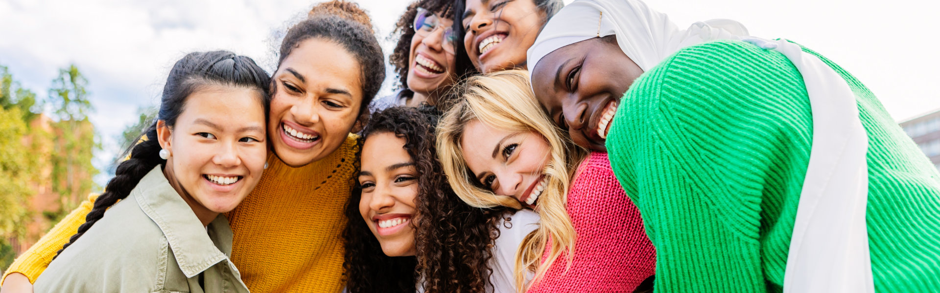 a group of teens hugging